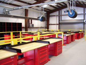 wood top workcenter with red cabinets